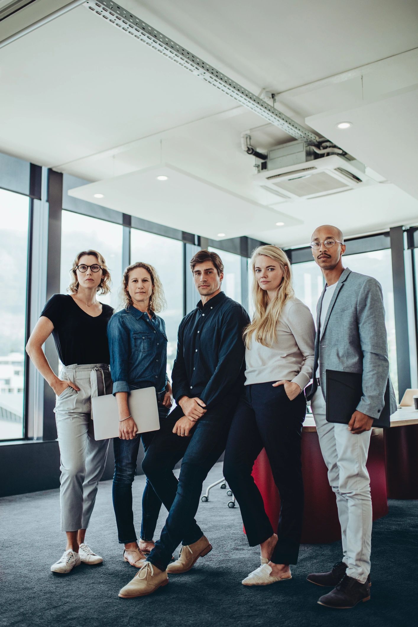 Event leadership team collaborating in a boardroom