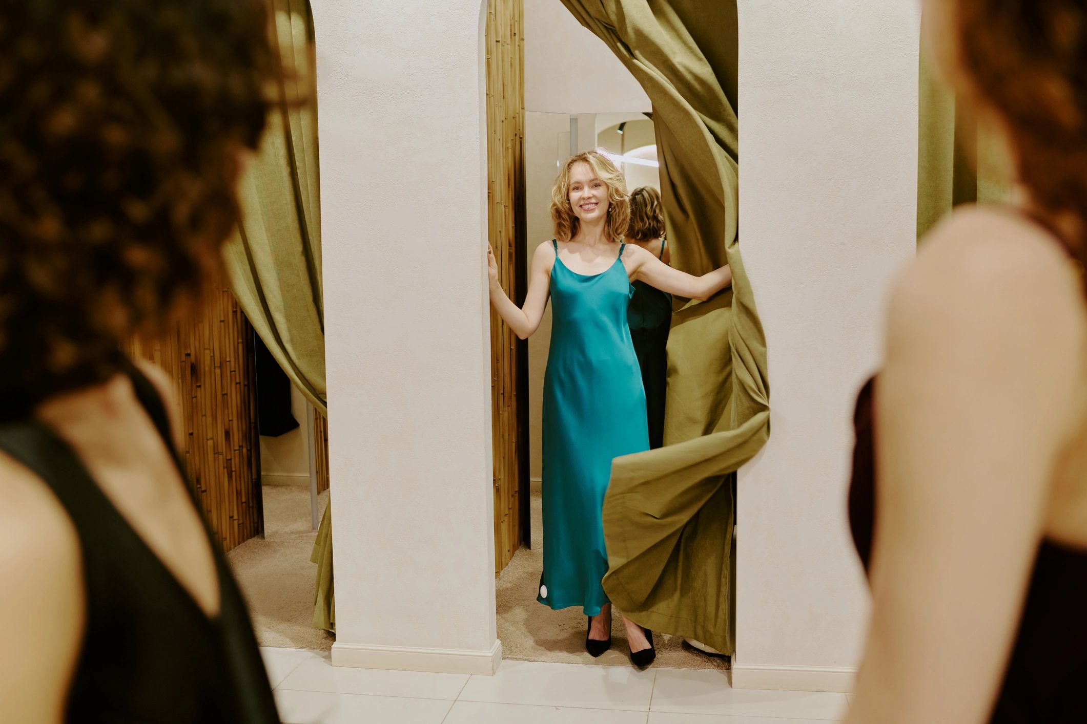 Woman Opening Fitting Room