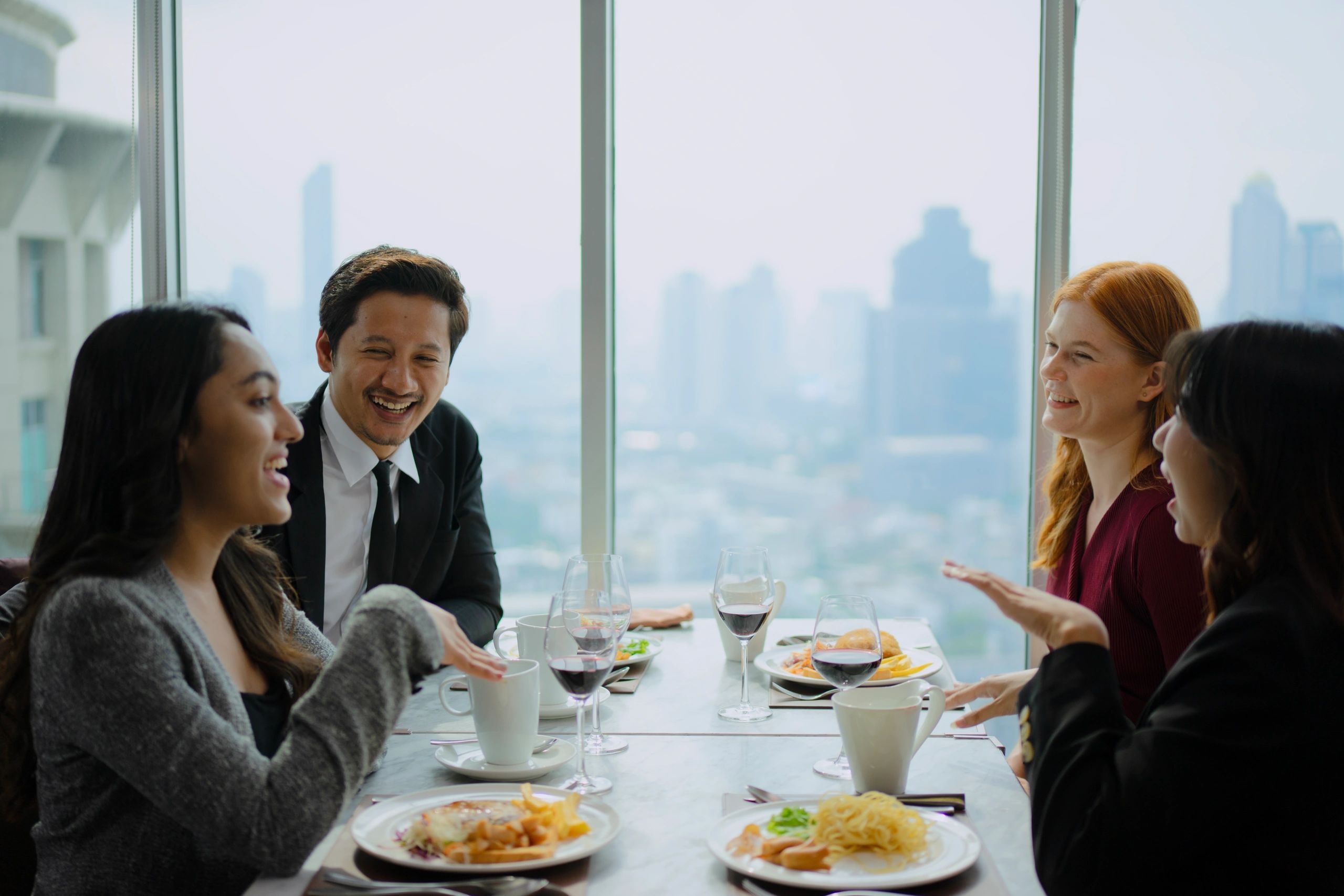 Group celebration in a luxury restaurant setting