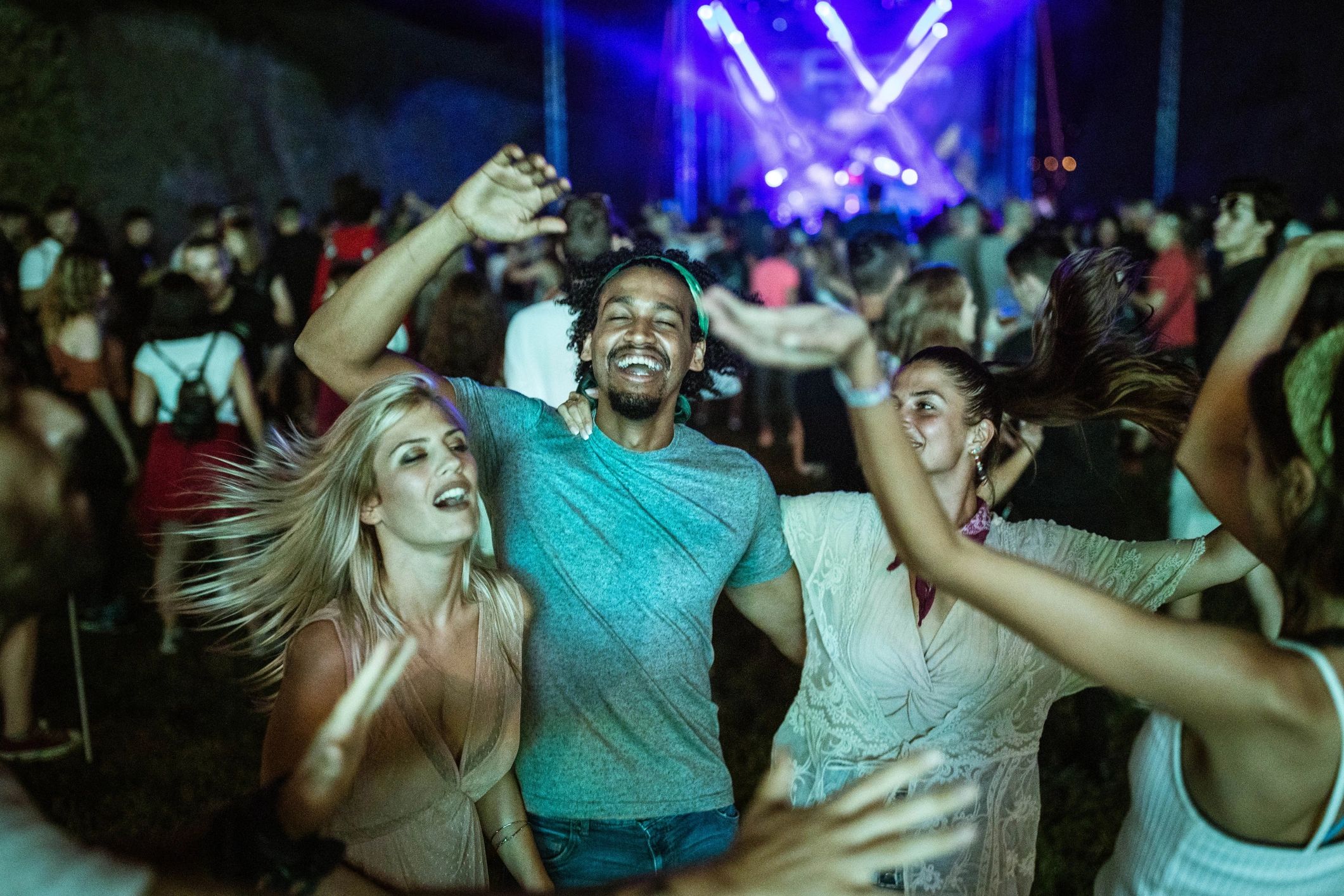 Guests dancing at a music event