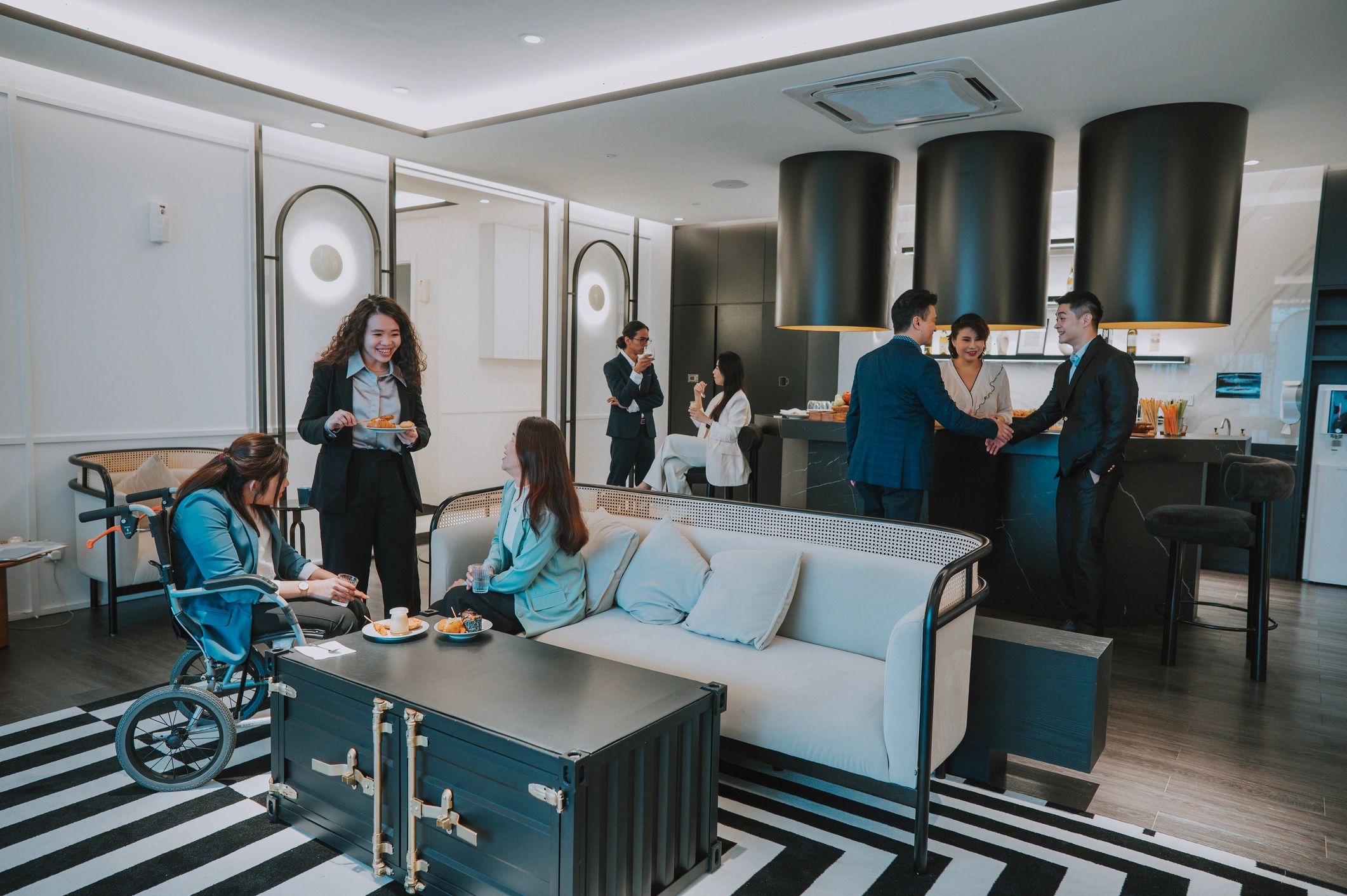 Guests networking in a stylish VIP lounge